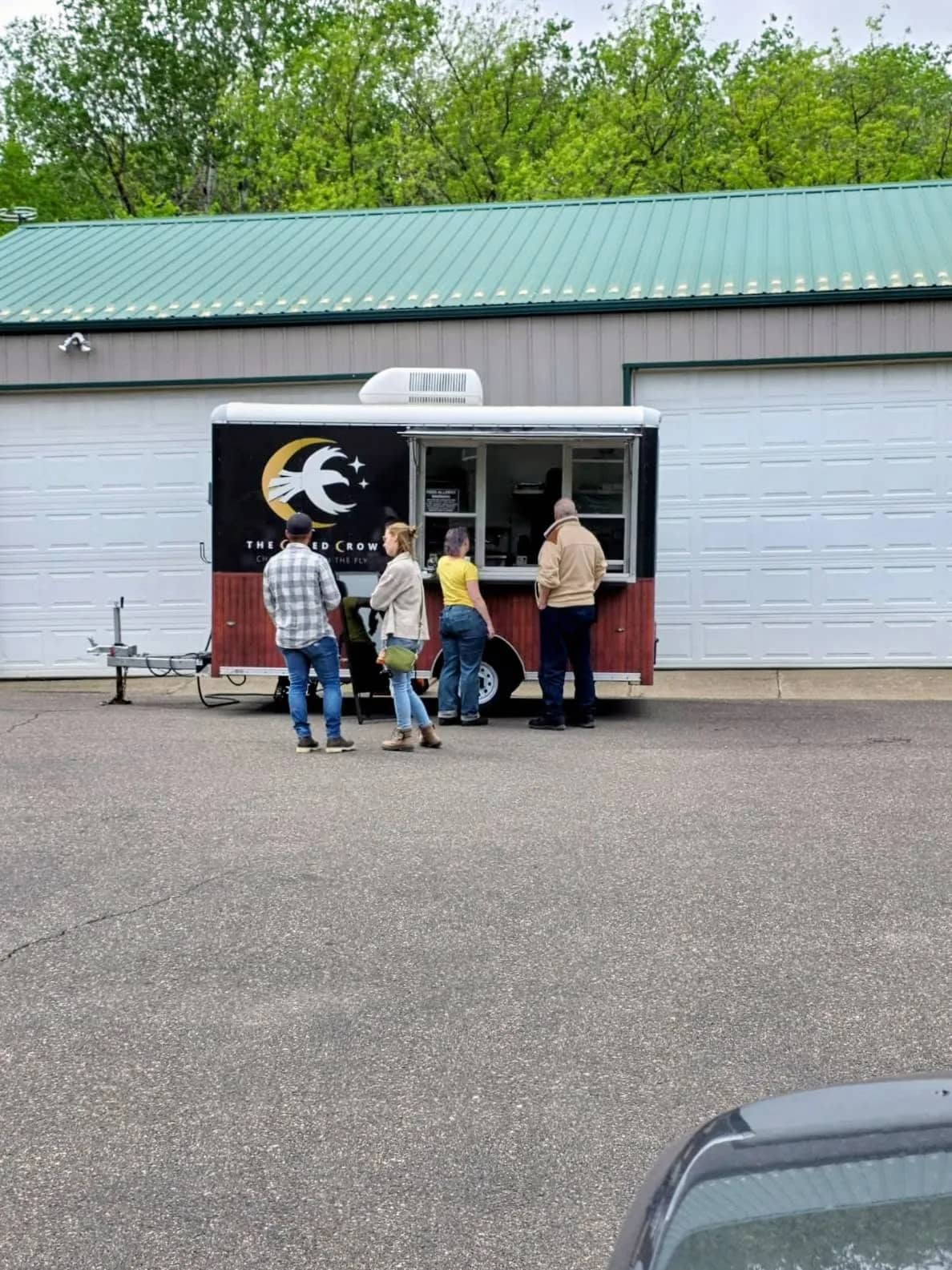 Guests gathered at The Cured Crow charcuterie trailer at a Ramsey, Minnesota event